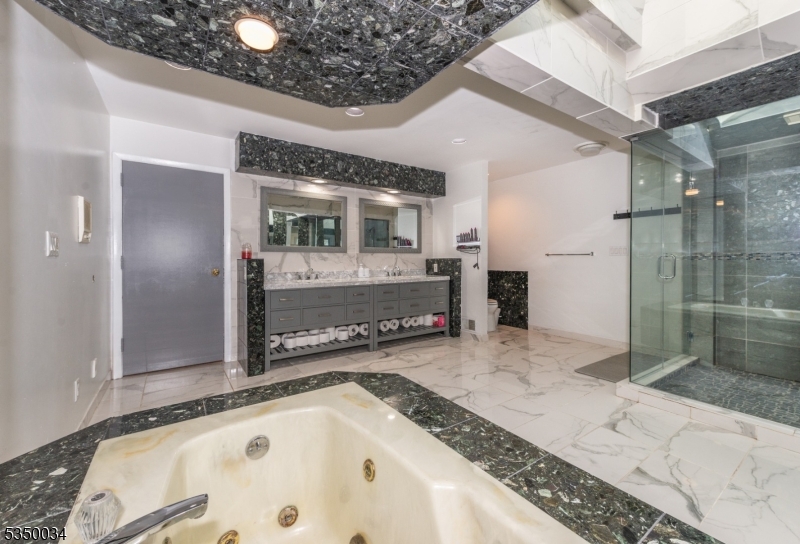 155 Route560 Layton, NJ 07851 - Photo 29 of 42 a bathroom with a granite countertop sink mirror and shower
