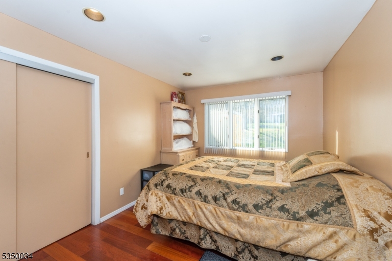 155 Route560 Layton, NJ 07851 - Photo 32 of 42 a bedroom with a bed and a window