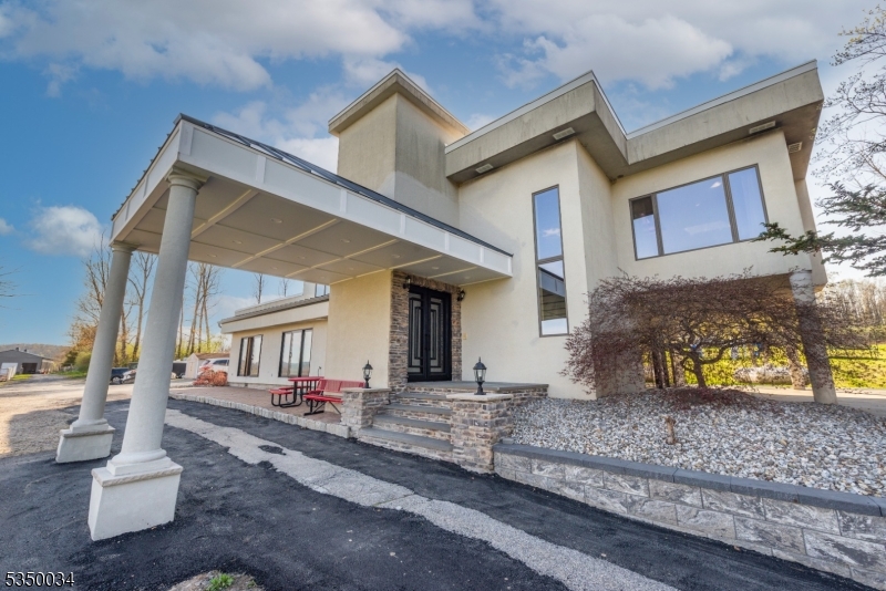 155 Route560 Layton, NJ 07851 - Photo 4 of 42 a front view of a house with garden