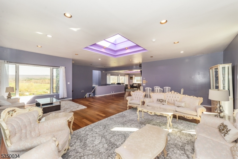 155 Route560 Layton, NJ 07851 - Photo 10 of 42 a living room with furniture and a large window