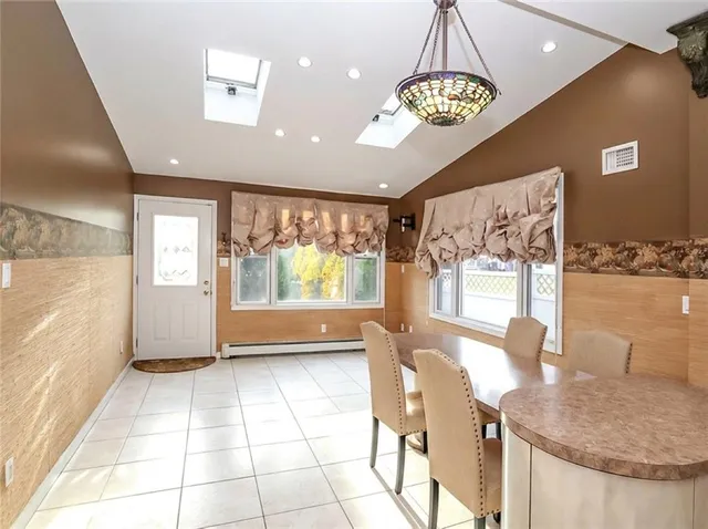 a view of a livingroom with furniture window and outside view