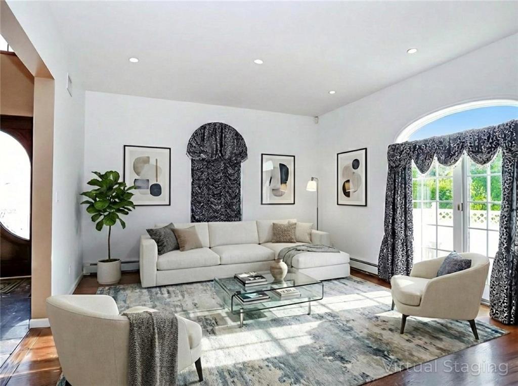 39 Hasbrouk Road Staten Island, NY 10304 - Photo 6 of 50 a living room with furniture and a large window