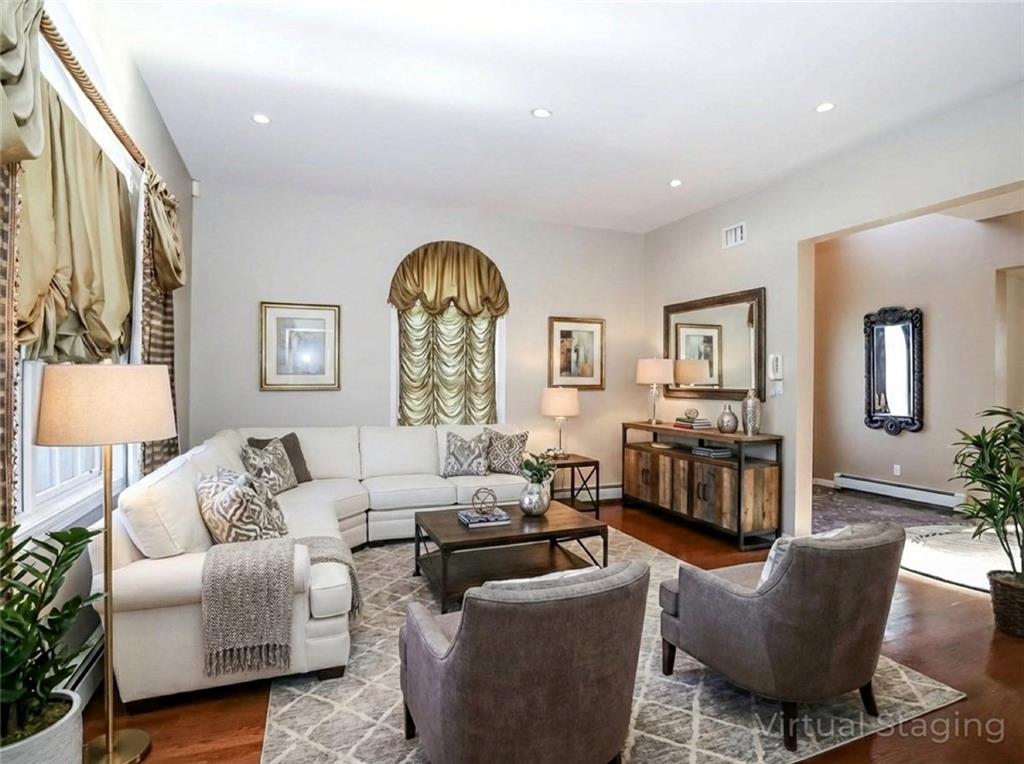 39 Hasbrouk Road Staten Island, NY 10304 - Photo 10 of 50 a living room with furniture and a window