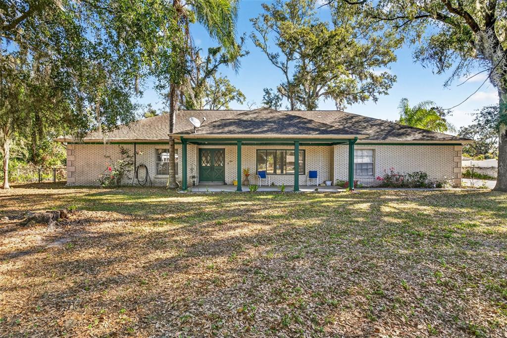 a view of a house with a swimming pool