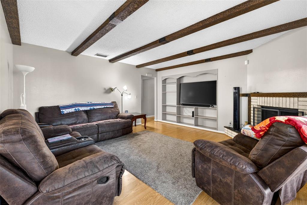 619 Limona Road Brandon, FL 33510 - Photo 14 of 32 a living room with furniture and a flat screen tv