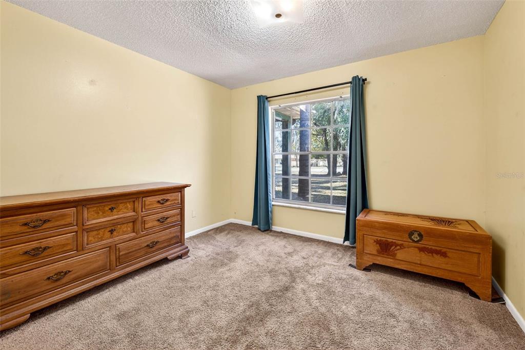 619 Limona Road Brandon, FL 33510 - Photo 19 of 32 a view of room with window and cabinet