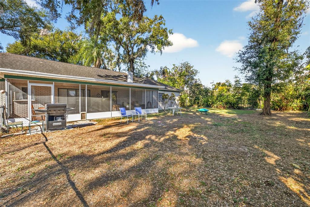 619 Limona Road Brandon, FL 33510 - Photo 29 of 32 a view of a house with backyard and sitting area