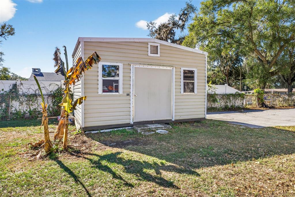 619 Limona Road Brandon, FL 33510 - Photo 32 of 32 a view of a house with a yard