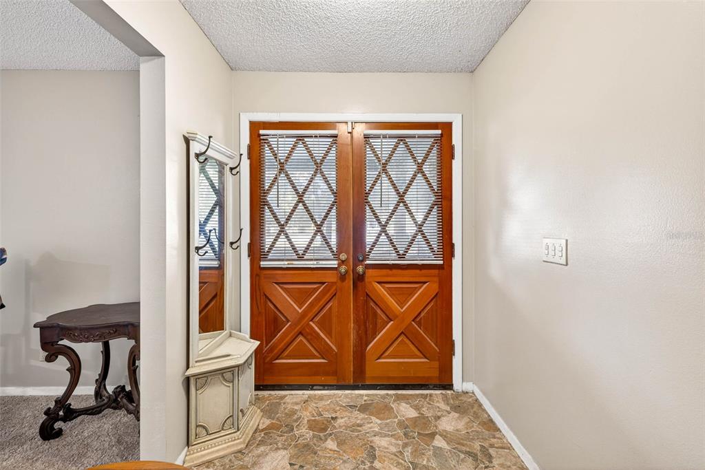 619 Limona Road Brandon, FL 33510 - Photo 6 of 32 a area with table and chair