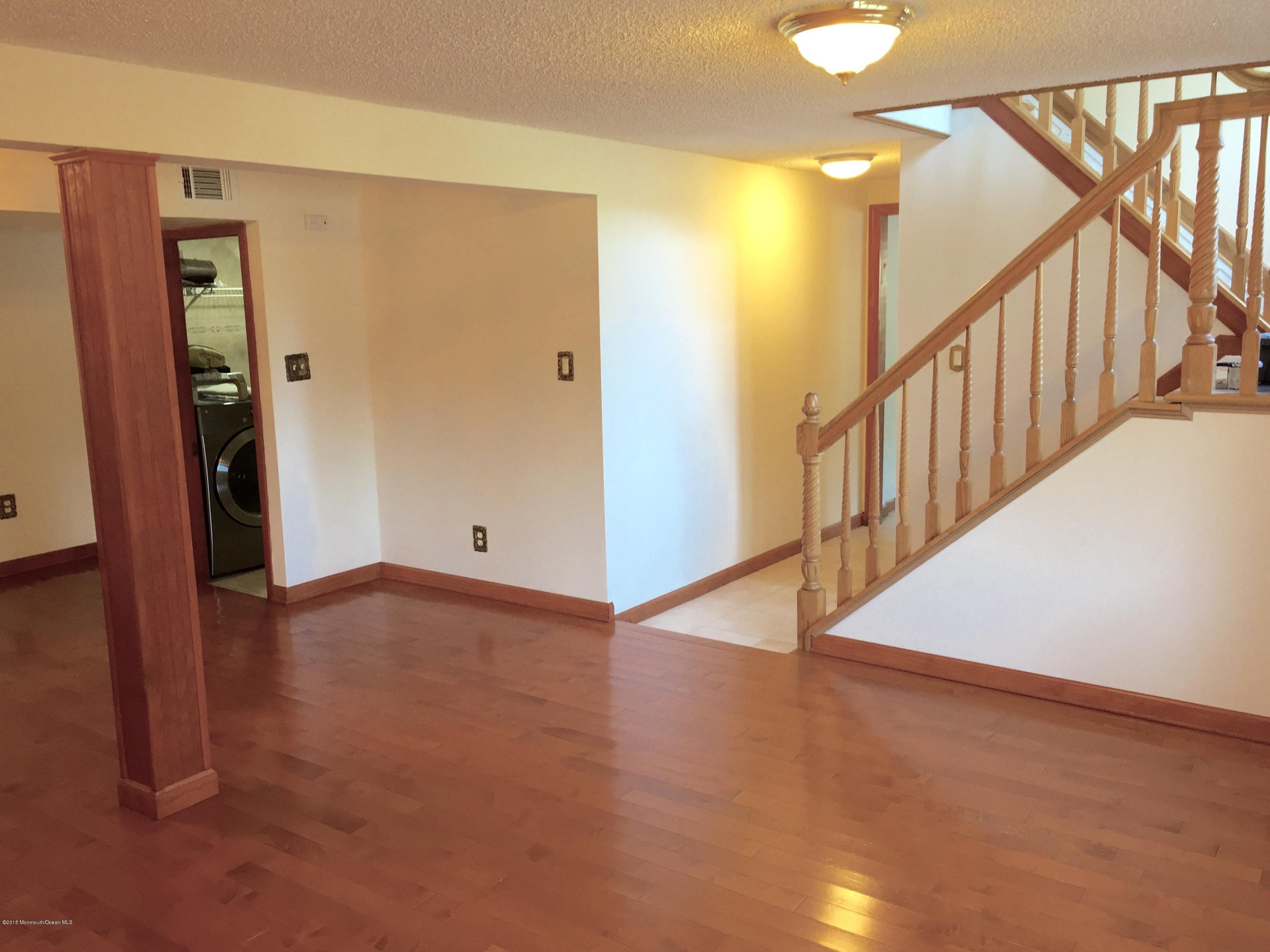 1 Alfred Court Neptune Township, NJ 07753 - Photo 24 of 26 a view of an entryway with wooden floor