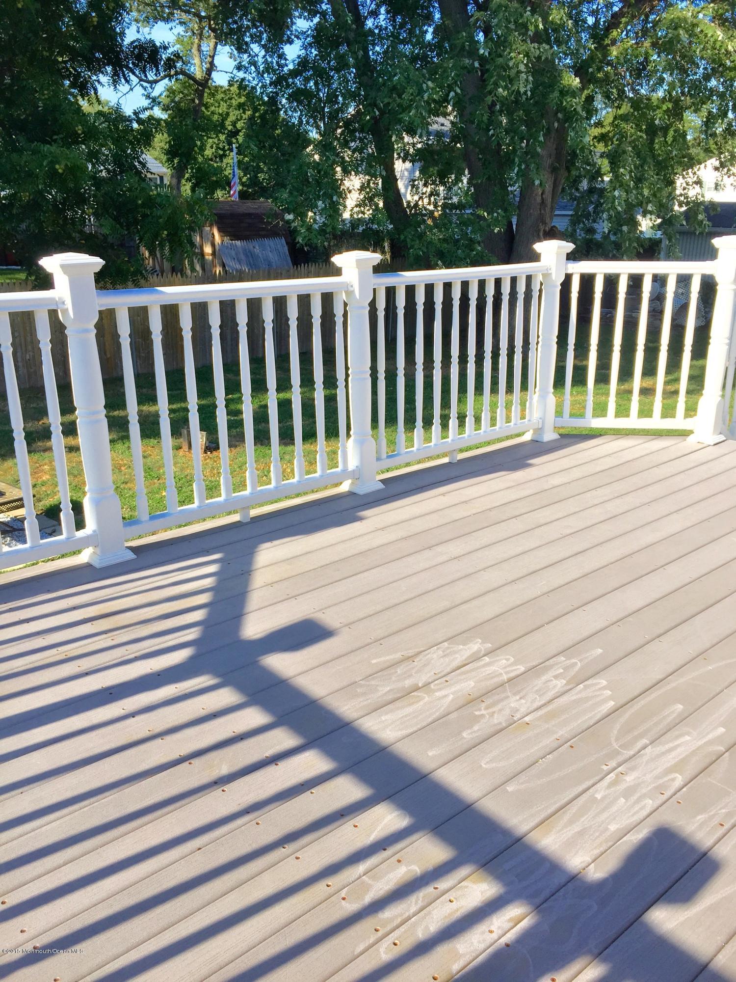 1 Alfred Court Neptune Township, NJ 07753 - Photo 9 of 26 a view of deck with a wooden fence