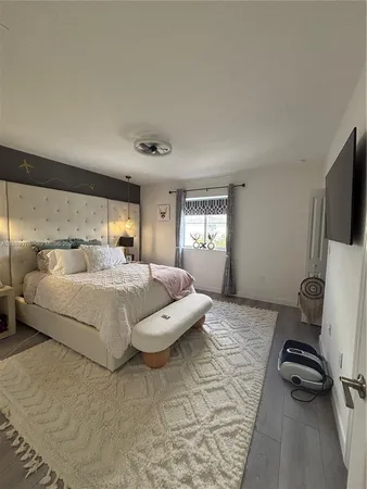 a bathroom with a sink toilet and a mirror