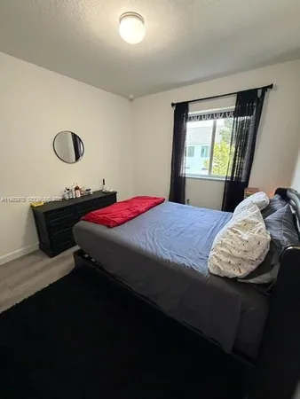 wooden floor and chair in a room