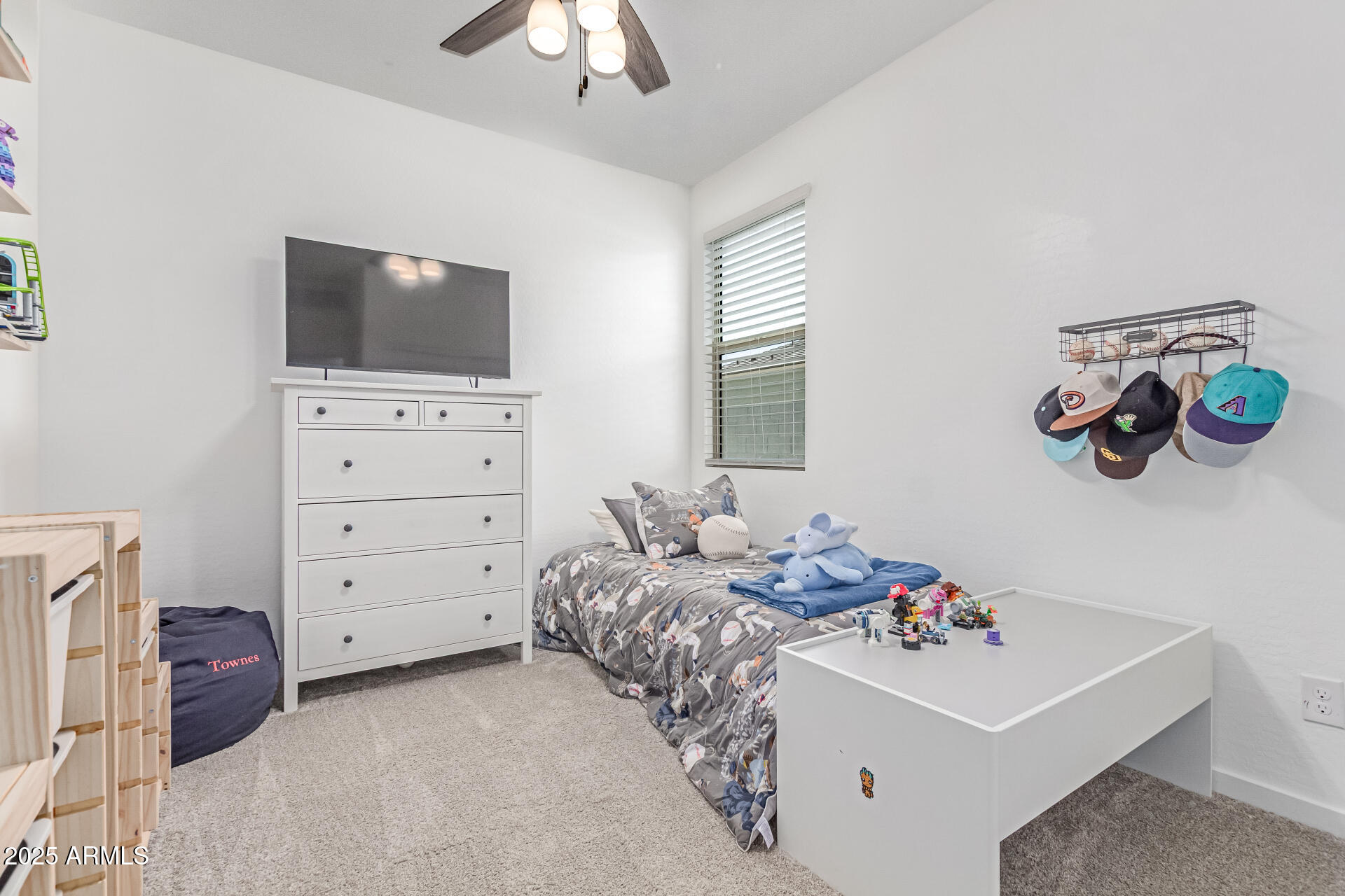 37287 North Azteca Road San Tan Valley, AZ 85140 - Photo 23 of 37 a bedroom with a bed and a flat screen tv