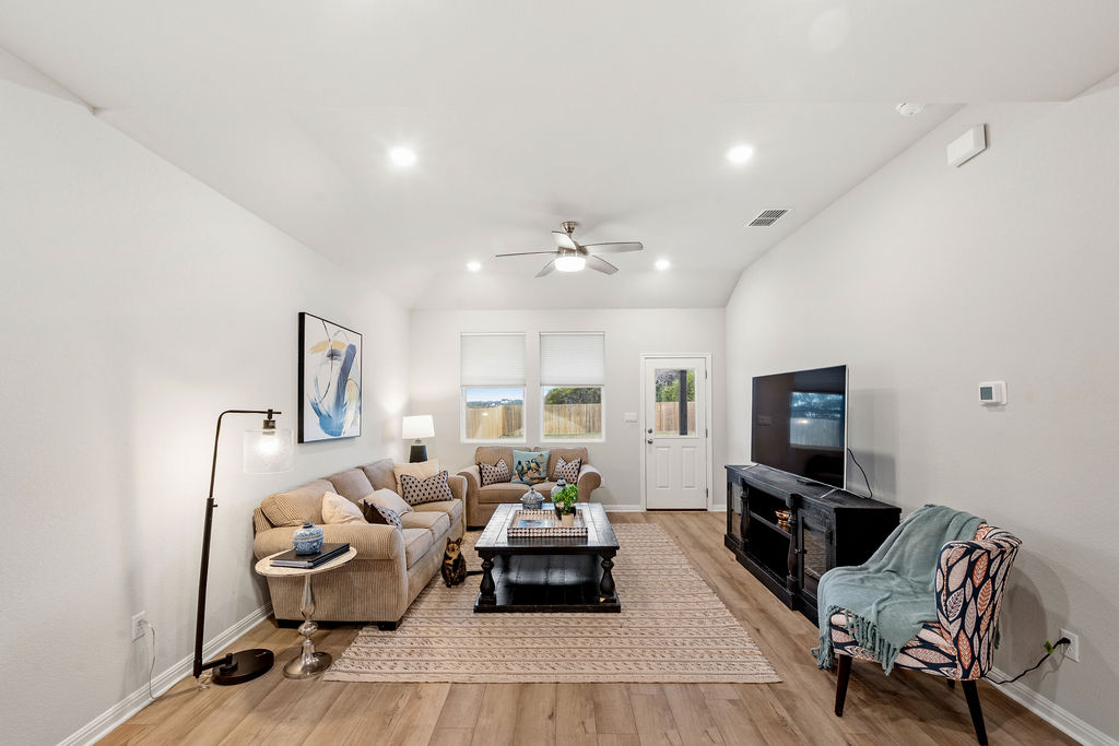 2417 Roosevelt Road Leander, TX 78641 - Photo 6 of 40 Living room featuring light wood-type flooring, a ceiling fan, and recessed lighting