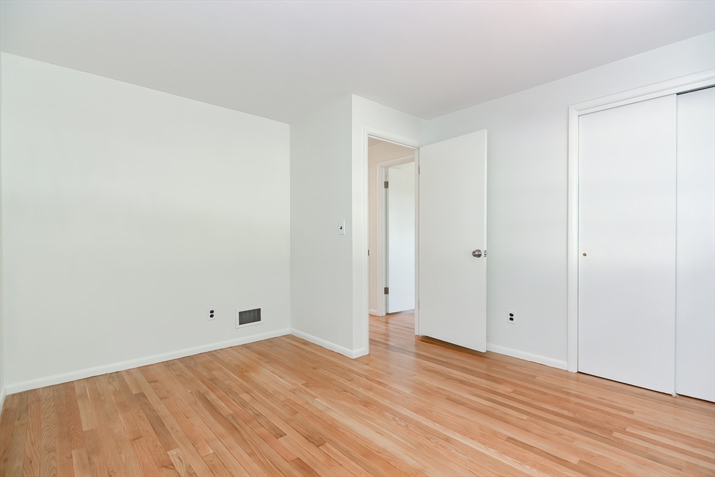 19 Ledgewood Road Framingham, MA 01701 - Photo 23 of 42 a view of empty room with wooden floor