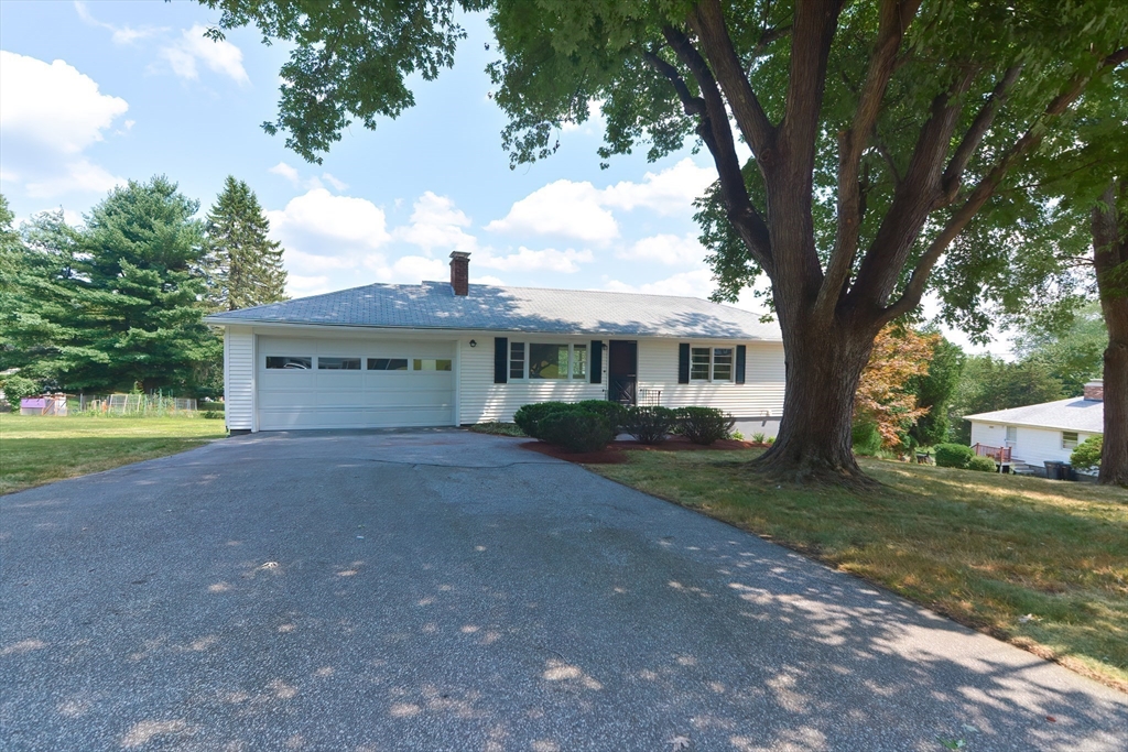19 Ledgewood Road Framingham, MA 01701 - Photo 3 of 42 a view of a house with a yard and large tree