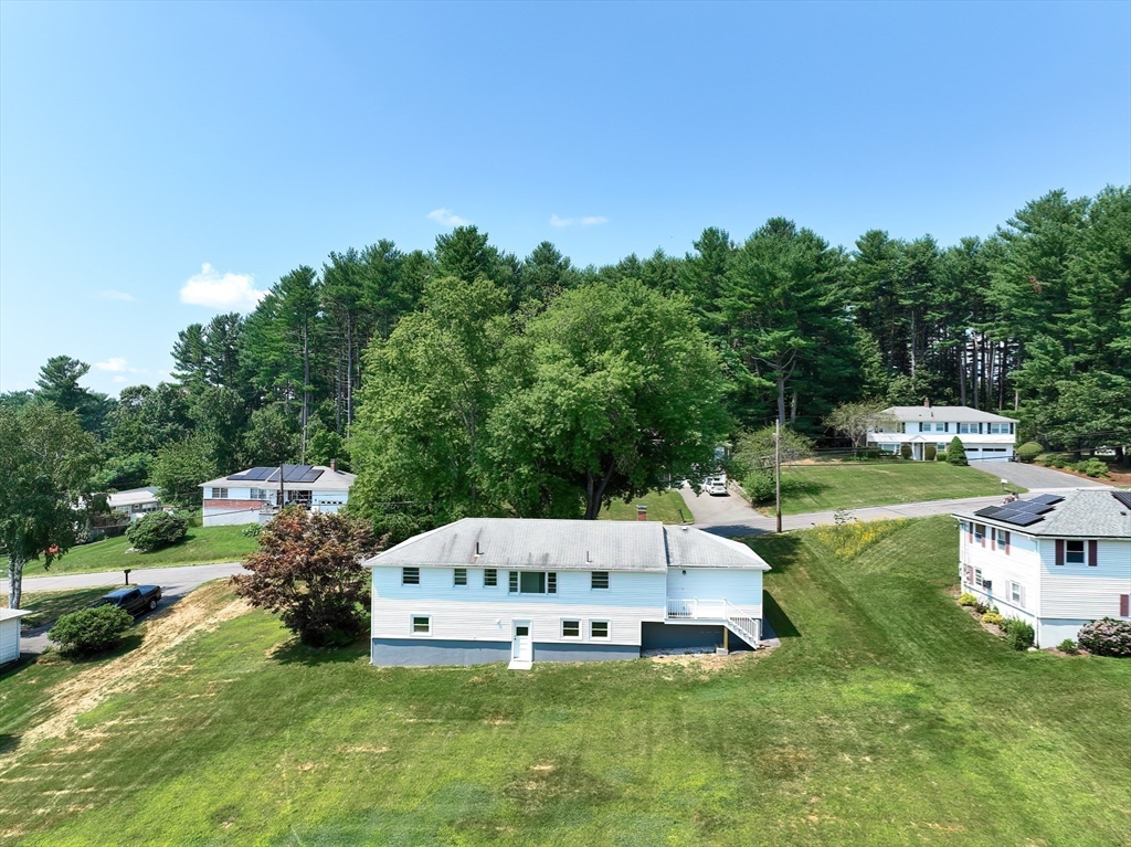 19 Ledgewood Road Framingham, MA 01701 - Photo 31 of 42 a garden view with a sitting space
