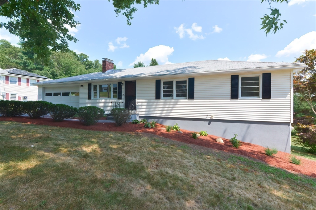 19 Ledgewood Road Framingham, MA 01701 - Photo 7 of 42 a front view of a house with garden