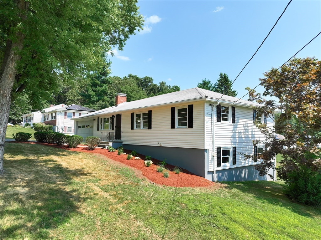 19 Ledgewood Road Framingham, MA 01701 - Photo 8 of 42 a front view of a house with a yard