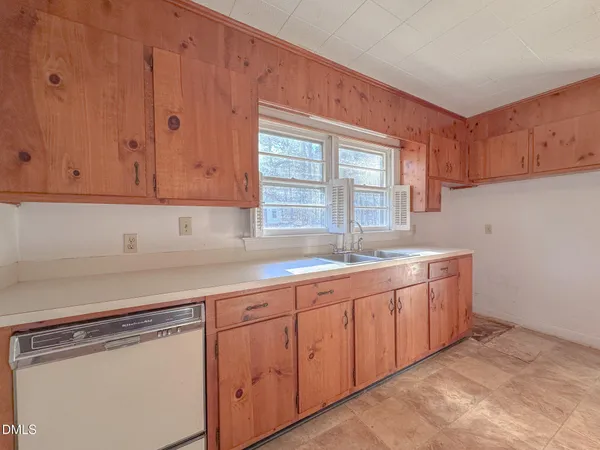 a view of a kitchen with cabinets