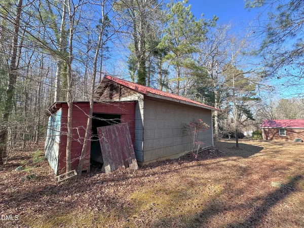 a view of the house with a large space