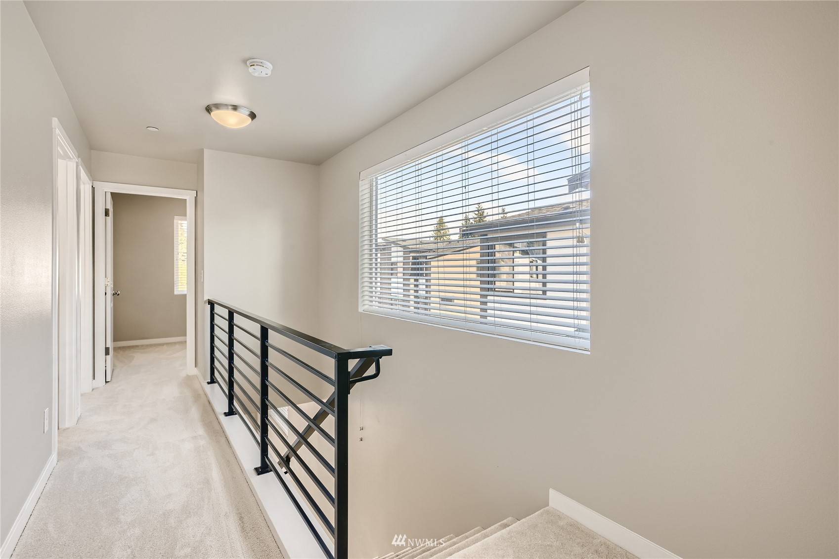 729 112th Street Southwest, Unit G1 Everett, WA 98204 - Photo 12 of 27 a view of a hallway with windows
