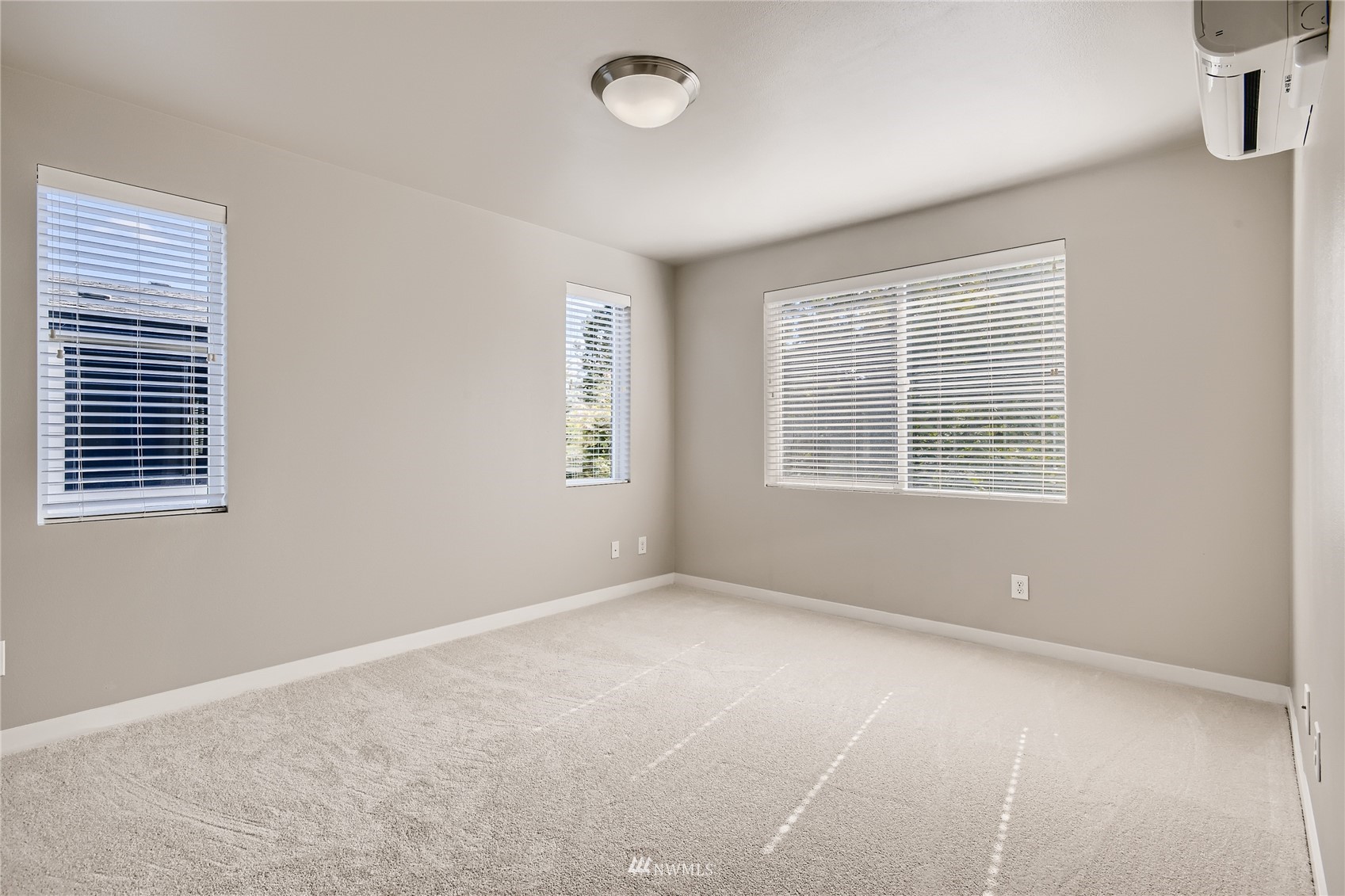 729 112th Street Southwest, Unit G1 Everett, WA 98204 - Photo 13 of 27 a view of an empty room with a window