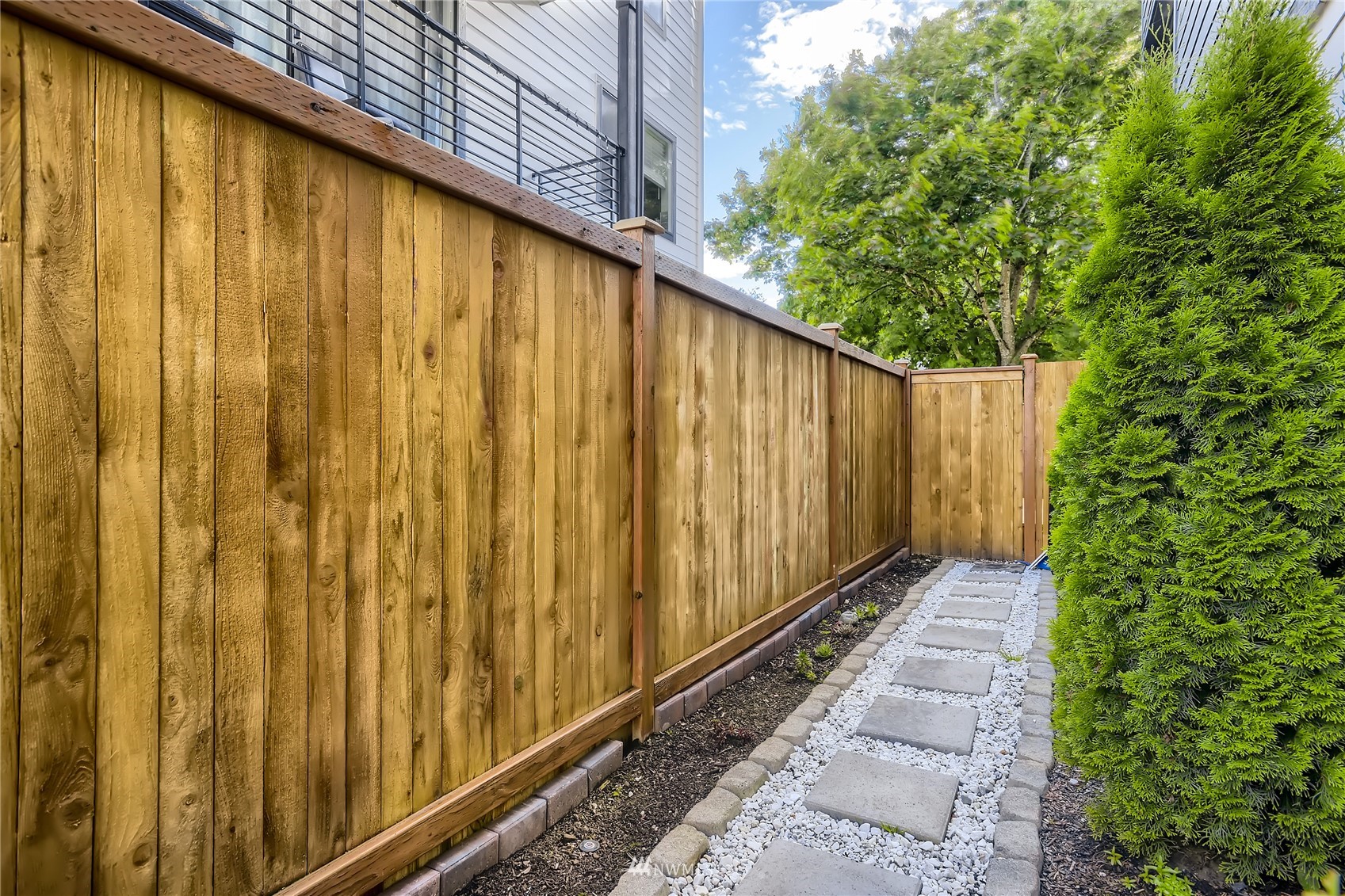 729 112th Street Southwest, Unit G1 Everett, WA 98204 - Photo 26 of 27 a view of a wooden fence