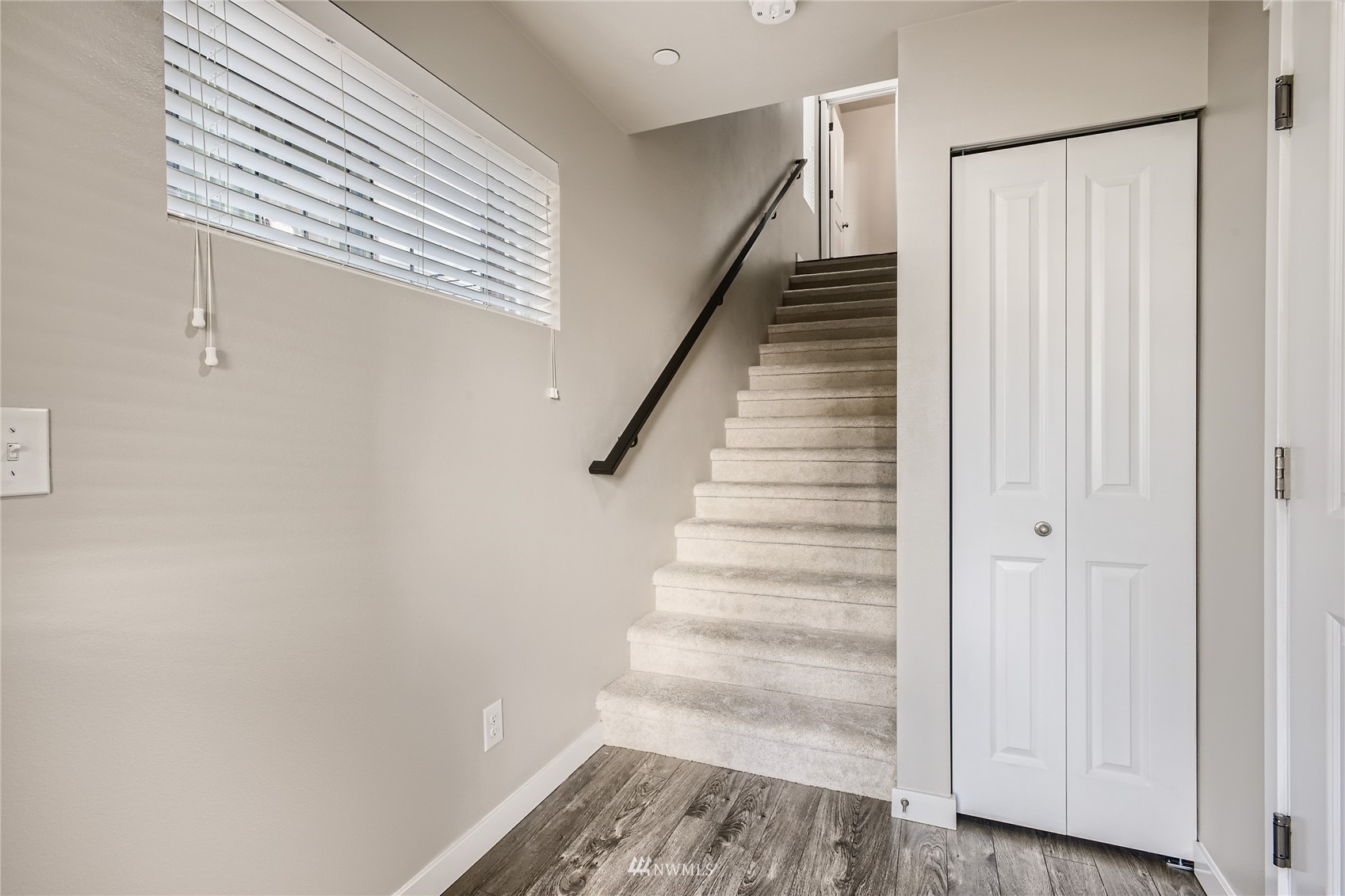 729 112th Street Southwest, Unit G1 Everett, WA 98204 - Photo 4 of 27 a view of entryway with stairs and wooden floor