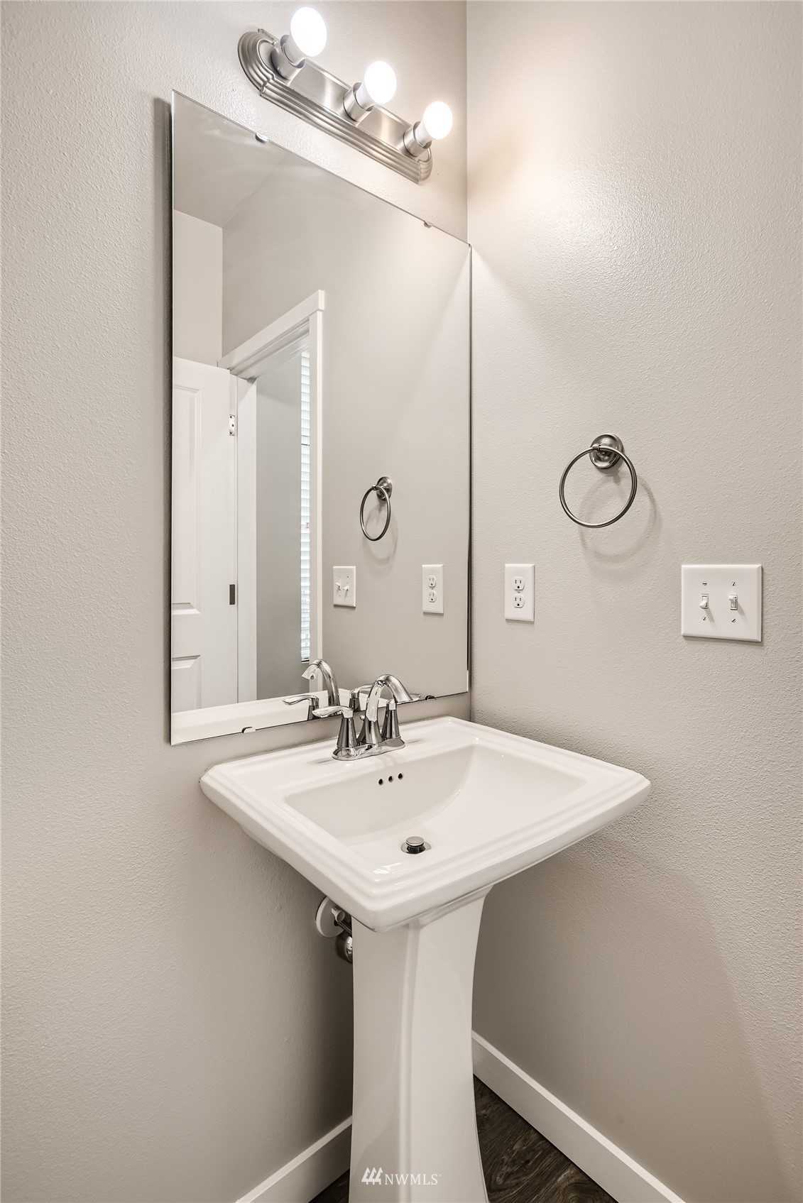 729 112th Street Southwest, Unit G1 Everett, WA 98204 - Photo 10 of 27 a bathroom with a sink and a mirror