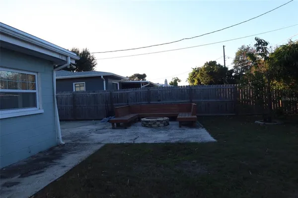 a view of a yard with an outdoor space