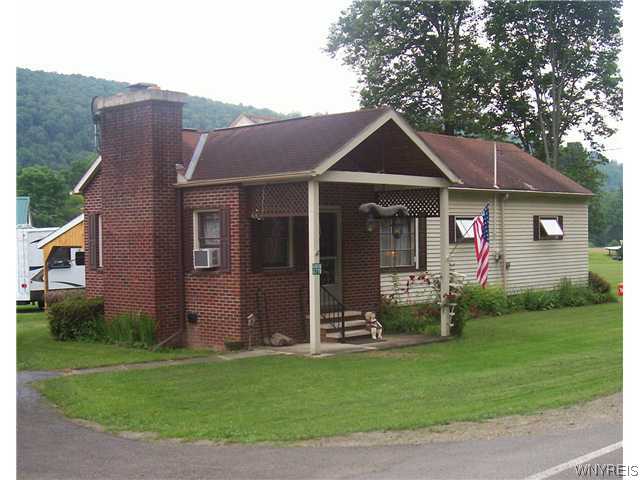6719 Cty Road Bolivar, NY 14715 - Photo 1 of 1 Exterior Front. Wonderful Brick Front Entrance to
