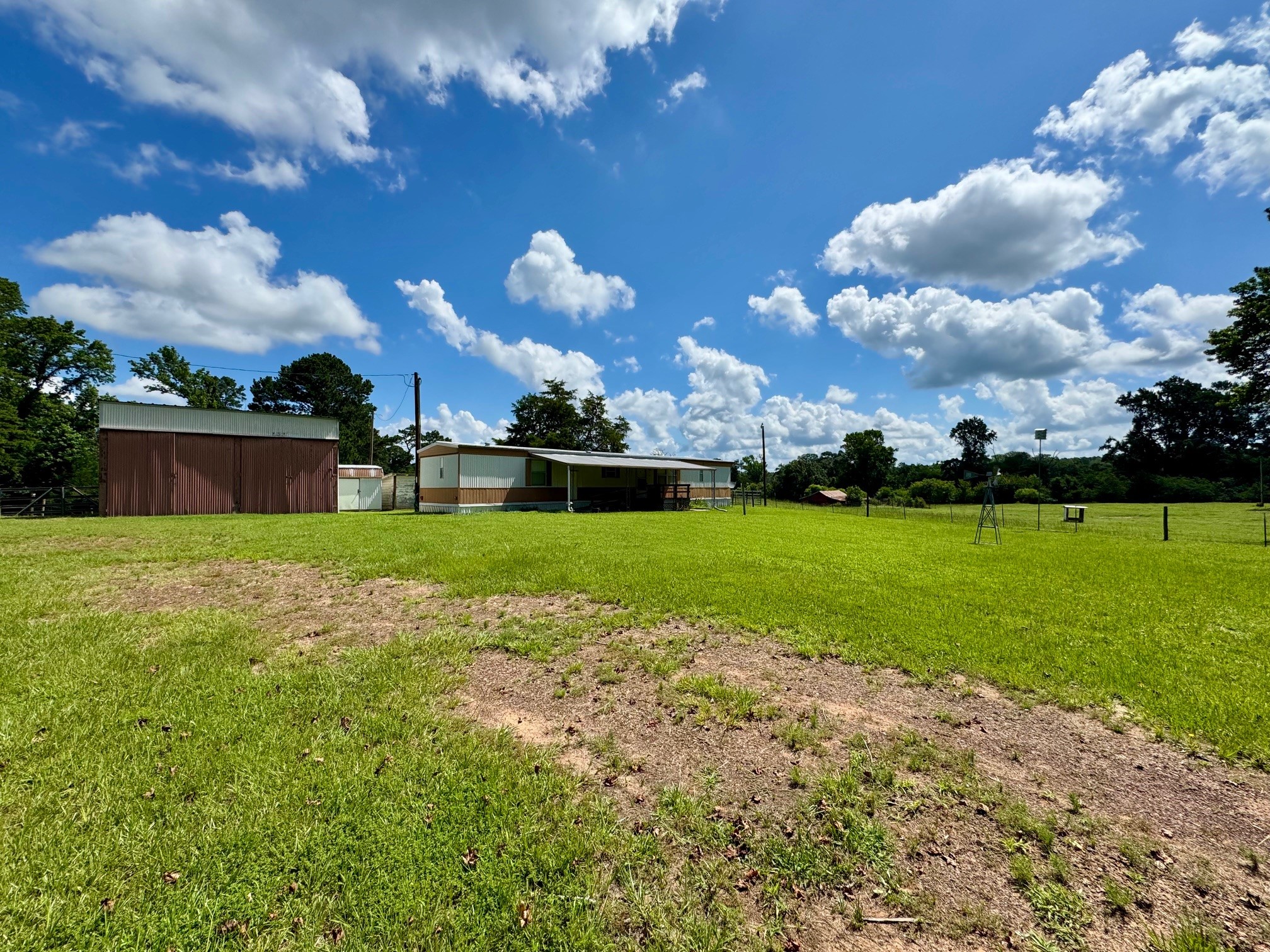 219 An County Road 185 Elkhart, TX 75839 - Photo 18 of 36 a view of yard with swimming pool and green space