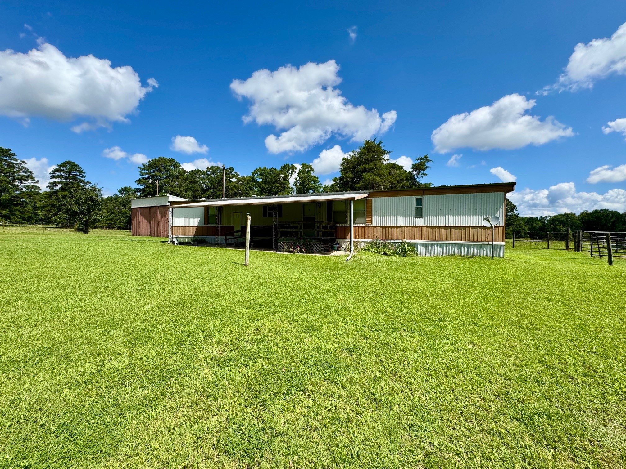 219 An County Road 185 Elkhart, TX 75839 - Photo 20 of 36 a view of a house with a yard