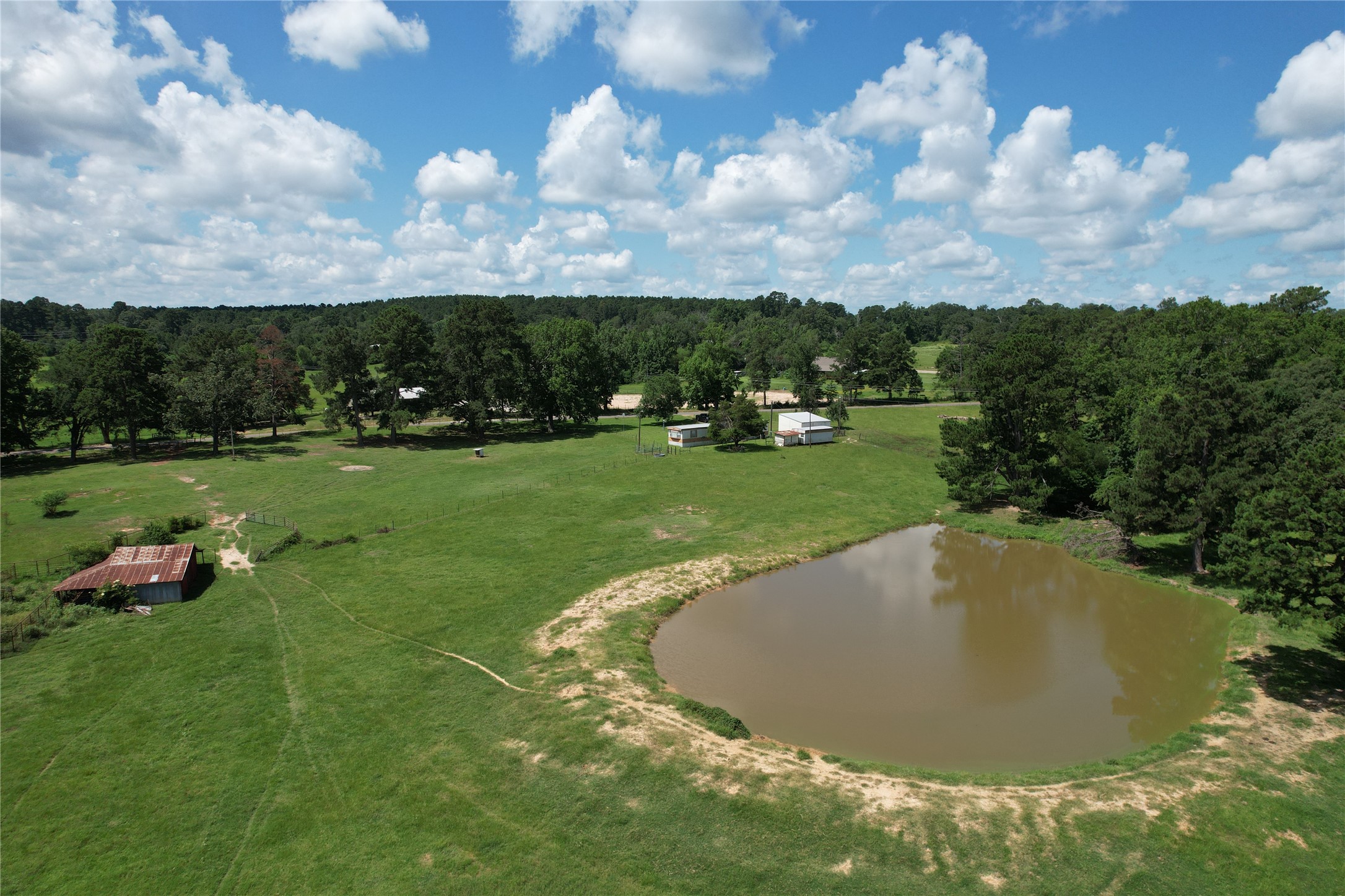 219 An County Road 185 Elkhart, TX 75839 - Photo 5 of 36 a view of a golf course with a garden