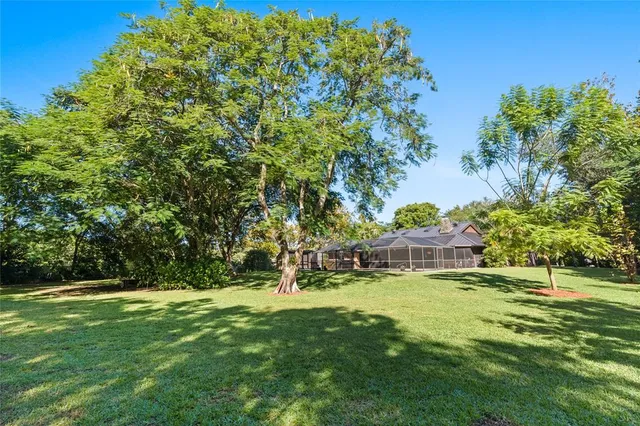 a view of swimming pool with a garden