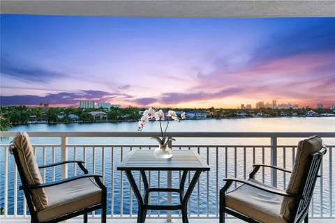 a view of a lake from a balcony
