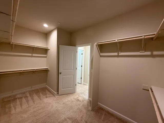 a view of a room with racks on the wall