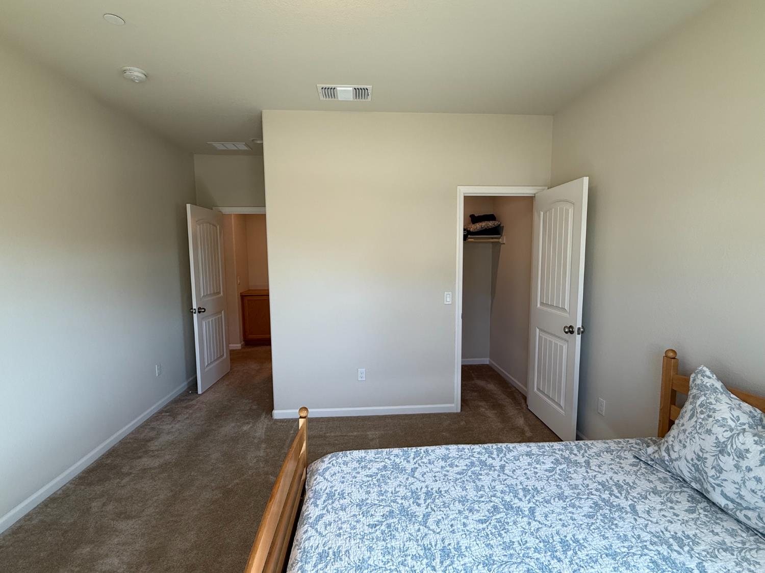 4344 Vanguard Drive Modesto, CA 95356 - Photo 28 of 48 a bedroom with a bed and wooden floor