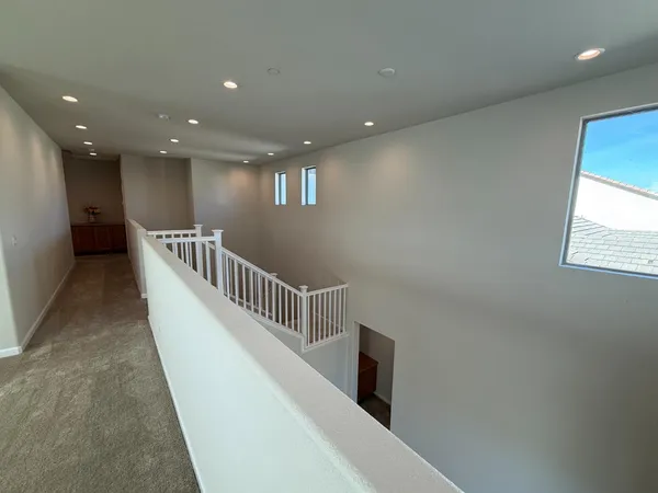 a view of hallway with washer and dryer