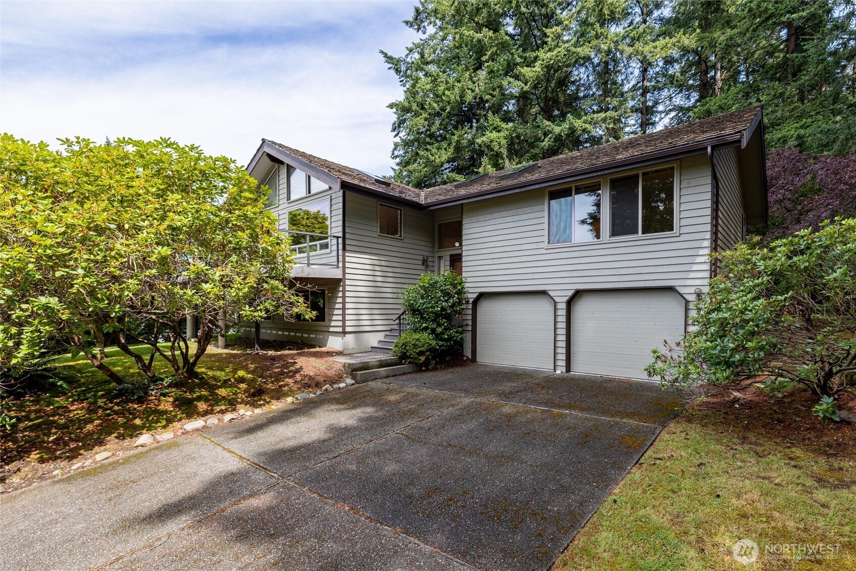 601 Clark Road Bellingham, WA 98225 - Photo 31 of 38 a house that has a tree in front of the house