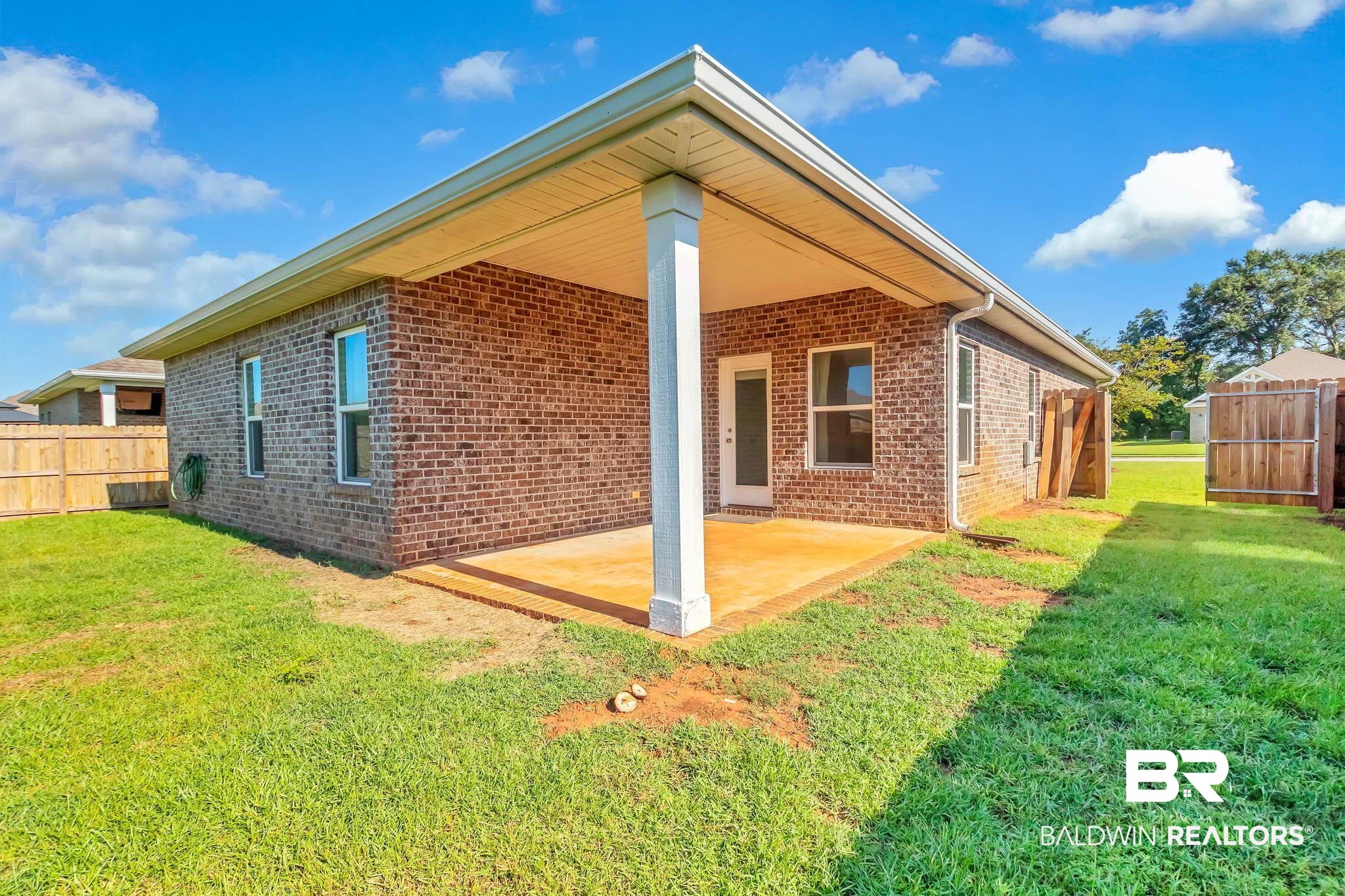 16461 Prado Loop Loxley, AL 36551 - Photo 69 of 78 Back of property featuring a patio area and brick siding