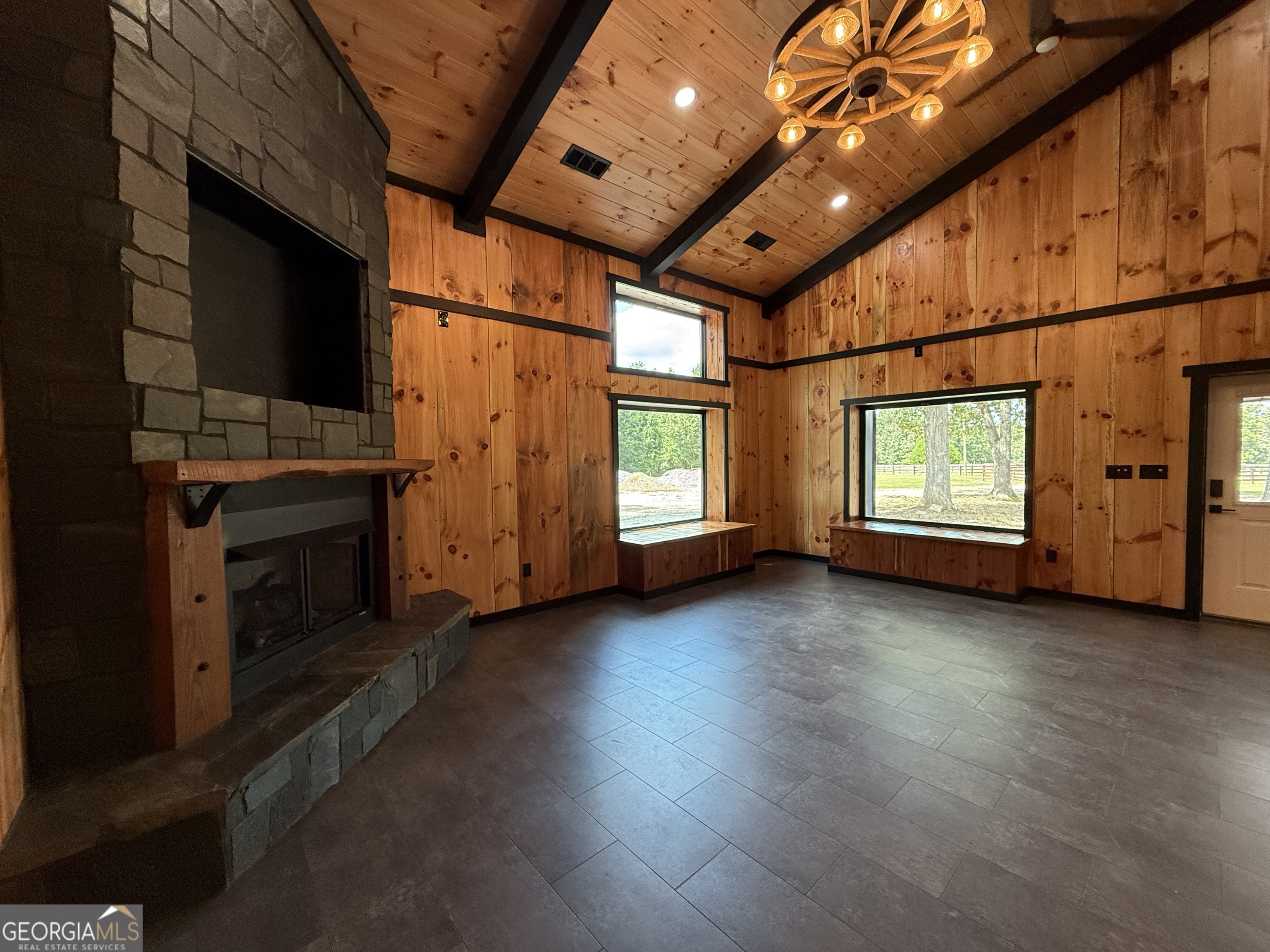630 Adolphus-Callaway Road Washington, GA 30673 - Photo 1 of 1 a view of empty room with wooden floor and fan