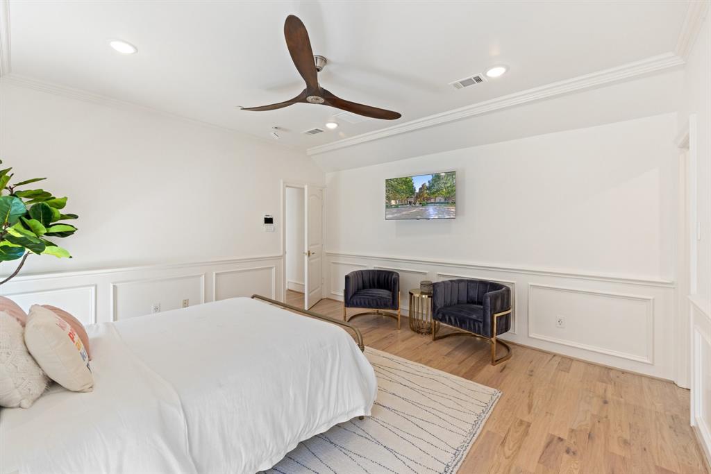 2 Terrabella Lane Heath, TX 75032 - Photo 25 of 40 a bedroom with a bed a desk and chair