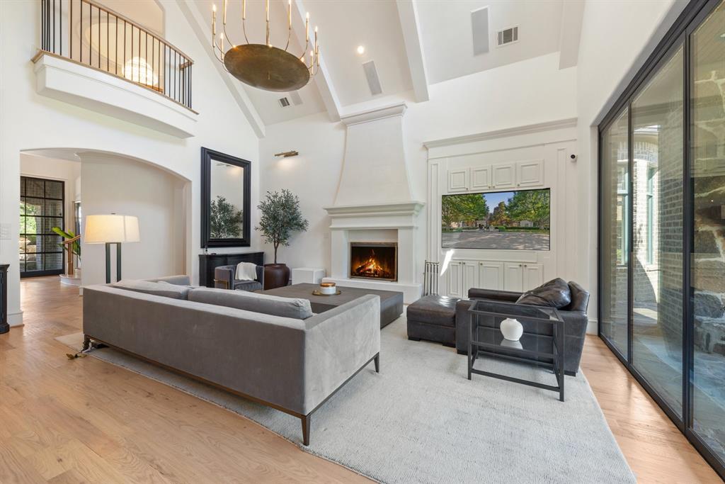 2 Terrabella Lane Heath, TX 75032 - Photo 6 of 40 a living room with furniture and a fireplace
