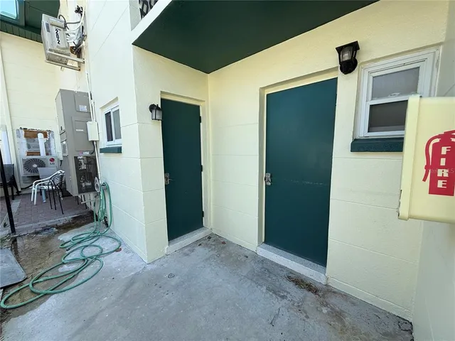 an entryway with livingroom in right side