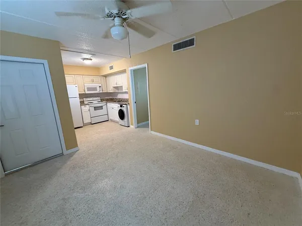 a view of a livingroom with a flat screen tv