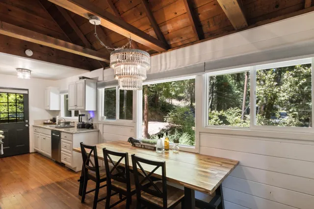 a workspace with furniture and a window