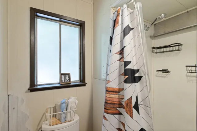 a view of a balcony with furniture